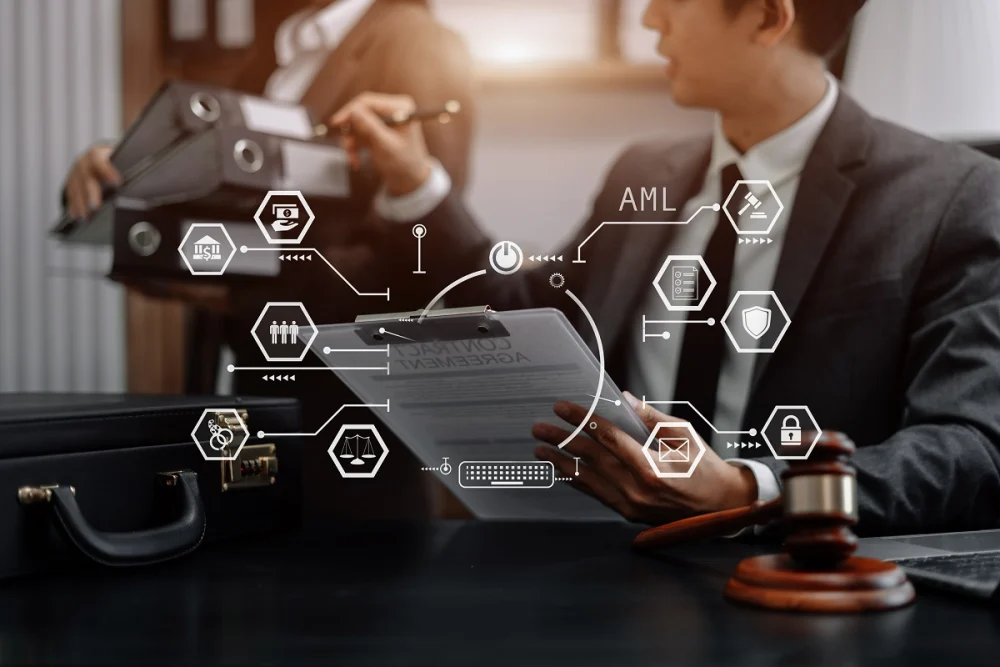 Financial professionals reviewing documents with AML compliance icons overlay, illustrating due diligence and regulatory oversight for banks