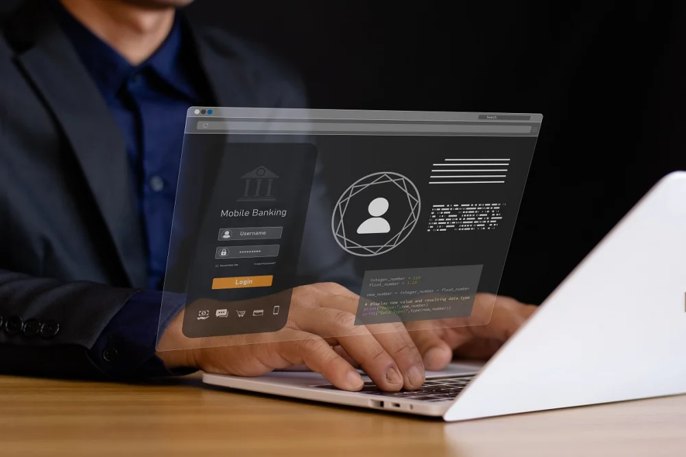 Business professional using a laptop with a banking login screen, illustrating digital onboarding and secure KYC integration 