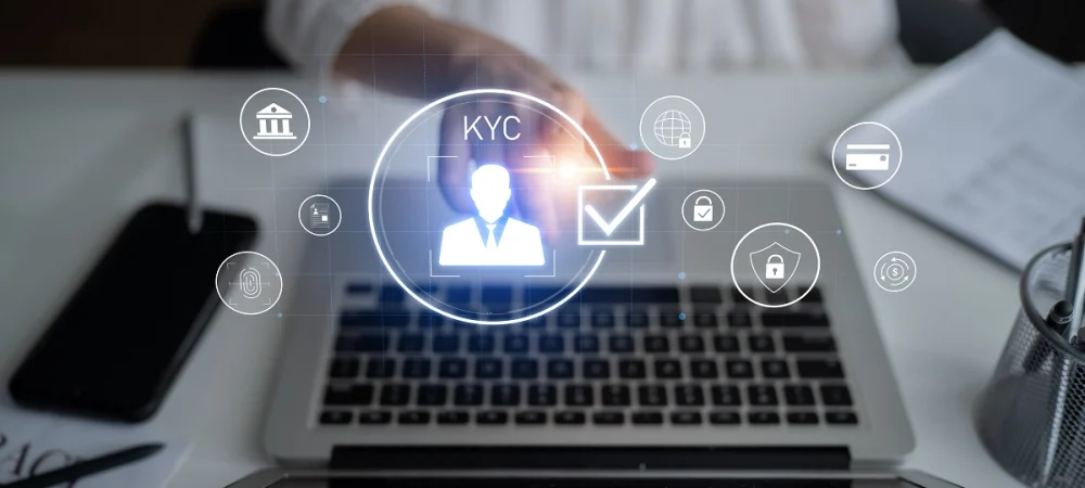 Digital interface showing KYC verification icons on a laptop screen, symbolizing automated KYC verification and data security