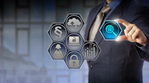 Business professional interacting with virtual security and compliance icons, including a lock, legal symbol, and cloud storage graphic